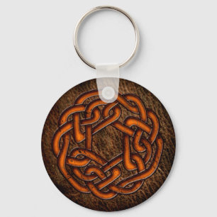 Bright orange celtic knot on leather schlüsselanhänger