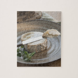 Brikkäse auf Teller Puzzle