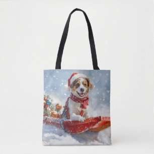 Brittany Spaniel Hund im Schlitten Weihnachten