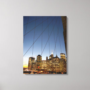 Brooklyn Bridge bei Dämmerung mit Manhattan-Skylin Leinwanddruck
