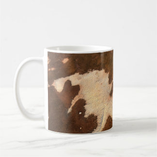 Brown and white floral textile kaffeetasse