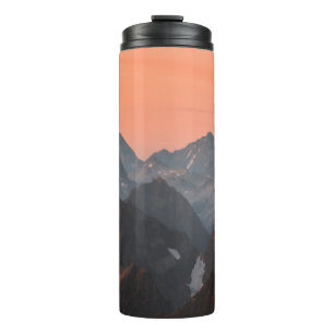 BROWN UND WEISSE BERGE UNTER ORANGE SKY THERMOSBECHER