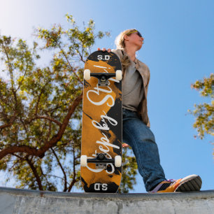 Brushy Orange Black Skateboard