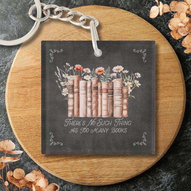 Bücher mit Blume und Zitat aus schwarzem Halbbrett Schlüsselanhänger (Close up)