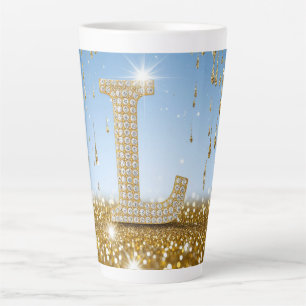 Buchstabe L auf goldenem Glitter-Hintergrund mit f Milchtasse