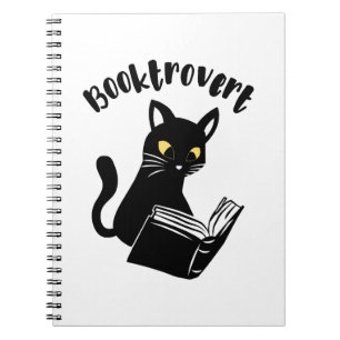 Buchtrovertekatze mit Buch