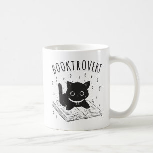 Buchtrovertekatze mit Buch und Sternen Kaffeetasse