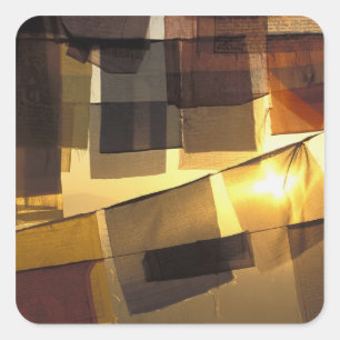 buddhistische Gebetsflaggen im Sonnenuntergang, Quadratischer Aufkleber