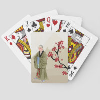 Buddhistischer Mönch, der Karten spielt
