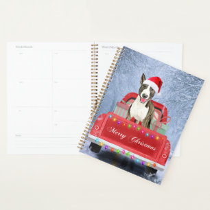 Bull Terrier Hund im Schnee sitzen in Weihnachten Planer