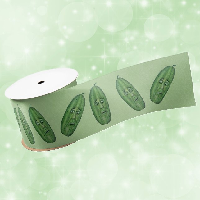 Bunch Funny faces on Green Pickles on light Green Satinband (bunch of green pickles with funny faces green eyes on light green gift wrap or craft ribbon.)
