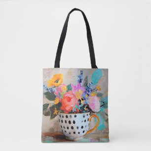 Bunte Blumen in einer Tasse mit Punkten