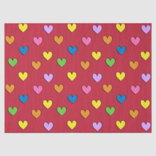 Bunte Herzen auf rotem Seidenpapier