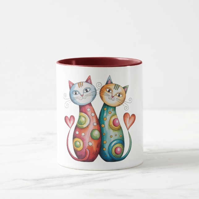 Bunte Kaffeetasse mit einem Paar liebenden Kätzche (Zentrum)