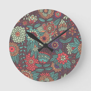 Buntes Blumenmuster in der Cartoonart Runde Wanduhr