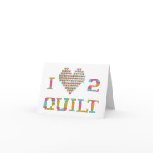 Buntes Herz-und Typografie-Steppdecken-Muster