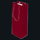 Burgund Geschenktüte Für Weinflaschen<br><div class="desc">Burgund ist eine tiefe,  reiche Farbe,  die dunkles Rot mit Untertönen von Lila und manchmal Braun verbindet. Sie wird oft als raffiniert,  luxuriös und warm beschrieben,  ähnlich der Farbe von Rotwein aus der Region Burgund in Frankreich.</div>
