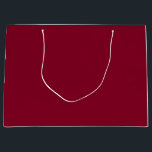Burgund Große Geschenktüte<br><div class="desc">Burgund ist eine tiefe,  reiche Farbe,  die dunkles Rot mit Untertönen von Lila und manchmal Braun mischt. Sie wird oft als raffiniert,  luxuriös und warm beschrieben,  ähnlich der Farbe von Rotwein aus der Region Burgund in Frankreich.</div>