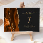 Burnt Orange Gold Agate Dark Wedding Tischnummer<br><div class="desc">Der links Rand dieser eleganten,  modernen Hochzeitskarte mit einer farbenfrohen,  orangefarbenen Tischnummer,  die mit einem vergoldeten Imitat-Glitzer bestickt ist. Der anpassbare Text kombiniert goldfarbene Handschriften mit kursiven und kopperplate-Schriftart auf dunkelschwarzem Hintergrund.</div>