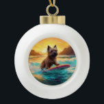 Cairn Terrier Beach Surfmalerei Keramik Kugel-Ornament<br><div class="desc">Tauchen Sie ein in die spielerische Welt des Kaninchen-Abenteuers mit diesem faszinierenden Bild. Ein gepflegter Hund geht zu den Wellen und reitet geschickt auf einem sonnengeküssten Strand. Das lebendige Kunstwerk vereint wunderbar das Wesentliche der Erregung am Strand, während der Hund furchtlos auf den Wellen reitet und den Geist von Spaß...</div>