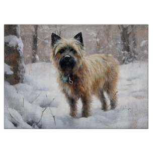 Cairn Terrier lässt es Weihnachten schnee Schneidebrett
