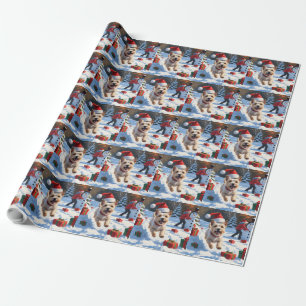 Cairn Terrier läuft im Schnee mit Weihnachtsmütze Geschenkpapier