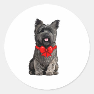 Cairn Terrier mit einer Weihnachtsbusskarte Runder Aufkleber
