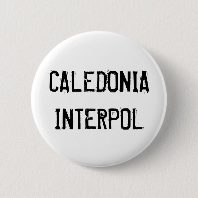 Caledonia Interpol Knopf Button (Vorderseite)