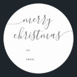 Calligrafie Minimalistisch Merry Christmas Gift Runder Aufkleber<br><div class="desc">Fügen Sie Ihren Urlaubsgeschenken eine charmante und persönliche Touch mit diesem reizvollen Weihnachtsaufkleber hinzu. Die Überschrift "Frohe Weihnachten" ist elegant in Kalligraphie gestaltet und verleiht Ihren Geschenken ein spielerisches, aber raffiniertes Gefühl. Unter den Begrüßungsfeldern "To" und "From" können Sie Ihre Geschenke mühelos mit einer persönlichen Note versehen. Dieser Aufkleber ist...</div>