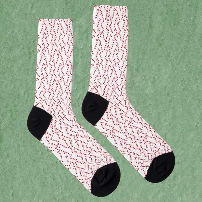 Candy Cane Muster rot und weiß Socken (A pair of socks with a red and white candy cane pattern.)