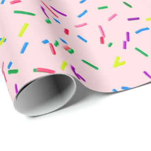 Candy Sprinkles auf rosa Geschenkpapier