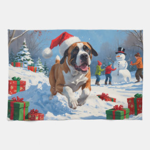 Cane Corso läuft im Schnee mit Weihnachtshut Geschirrtuch