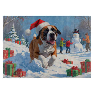 Cane Corso läuft im Schnee mit Weihnachtsmütze Schneidebrett