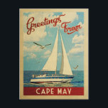 Cape May Sailboat Vintage Travel New Jersey Postkarte<br><div class="desc">Dieses Greetings From Cape May New Jersey Vintage Reise nautische Design verfügt über ein Boot auf dem Wasser mit Möwen und einen blauen Himmel gefüllt mit prächtigen puffigen weißen Wolken.</div>
