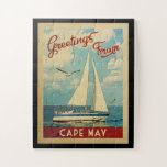 Cape May Sailboat Vintage Travel New Jersey Puzzle<br><div class="desc">Dieses Greetings From Cape May New Jersey Vintage Reise nautische Design verfügt über ein Boot auf dem Wasser mit Möwen und einen blauen Himmel gefüllt mit prächtigen puffigen weißen Wolken.</div>