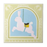 Carousel Rabbit von June Erica Vess Fliese<br><div class="desc">Hop zusammen mit diesem Karussell-Druck von Juni Erica Vess. Mit diesem Aufdruck erstellen Sie heute einen Vergnügungspark auf dem Kinderzimmer Ihres Kindes!</div>