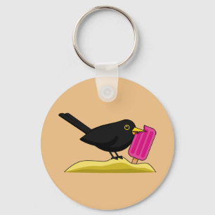 Cartoon Blackbird isst eine Eiscreme Schlüsselanhänger
