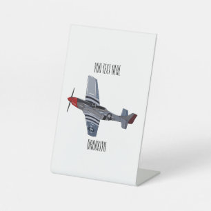 Cartoon-Illustration für Kampfbomber Sockelschild
