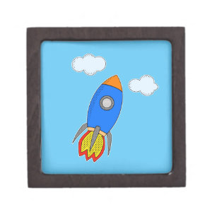 Cartoon Space Rocket in Blue Sky Schachtel