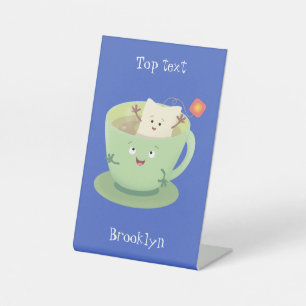 Cartoon-Zeichen für den niedlichen Teebag-Becher S Sockelschild