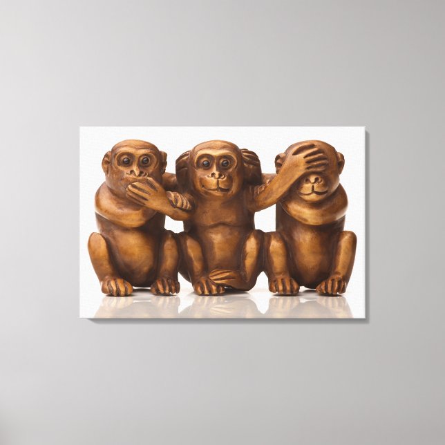 Carving of three wooden monkeys leinwanddruck (Vorderseite)
