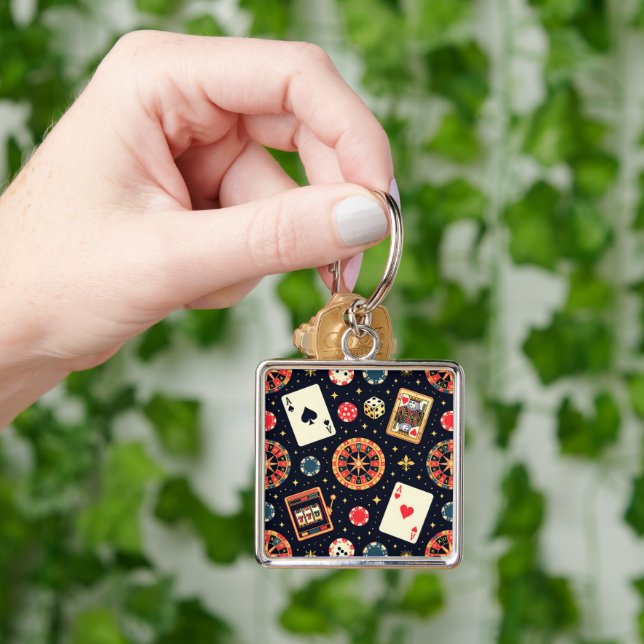 Casino pattern theme on black schlüsselanhänger (Hand)