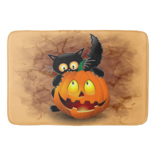 Cat Fun Halloween Charakter beißt einen Kürbis Badematte