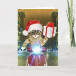 Cat in the Santa Claus hat delivers Christmas gift Karte<br><div class="desc">Cat christmas kitty animal,  speed fast ried moped,  motorbike motorcycle scooter gift,  cub tabby beautiful kitten ,  humor merry adorable feline,  delivery fluffy furry cap,  domestic xmas funny ,  cute hat pet winter ,  holiday red santa claus ,  animal christmas kitty , </div>