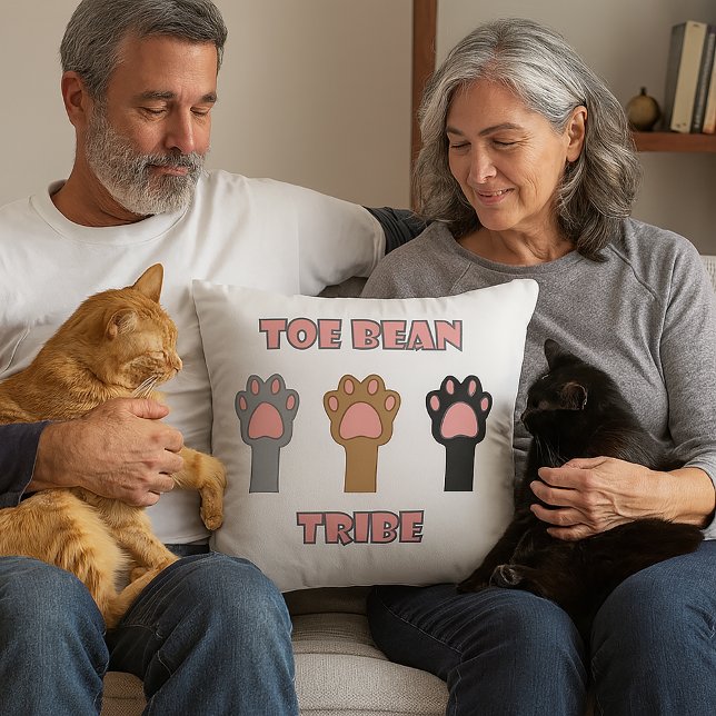 Cat Paws Toe Bean Tribe Kissen (A throw pillow with three cat paws and the words toe bean tribe.)