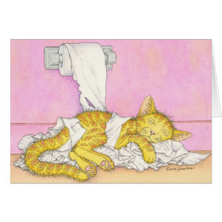 CAT schläft im Toilettenpapier