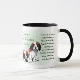 Cavalier King Charles Spaniel gibt Tasse