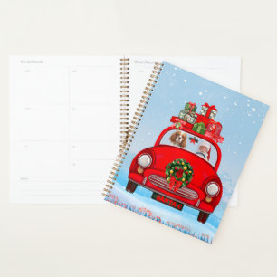 Cavalier King Dog in Auto mit dem Weihnachtsmann Planer