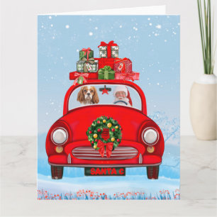Cavalier King Hund im Auto mit dem Weihnachtsmann  Karte