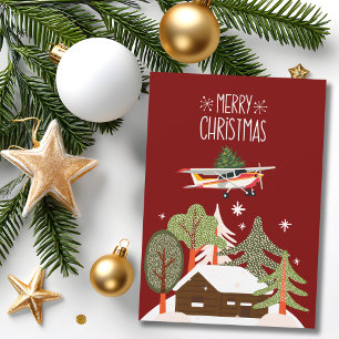 Cessna-Flugzeug trägt Weihnachtsbaum-Foto Lustig Feiertagskarte